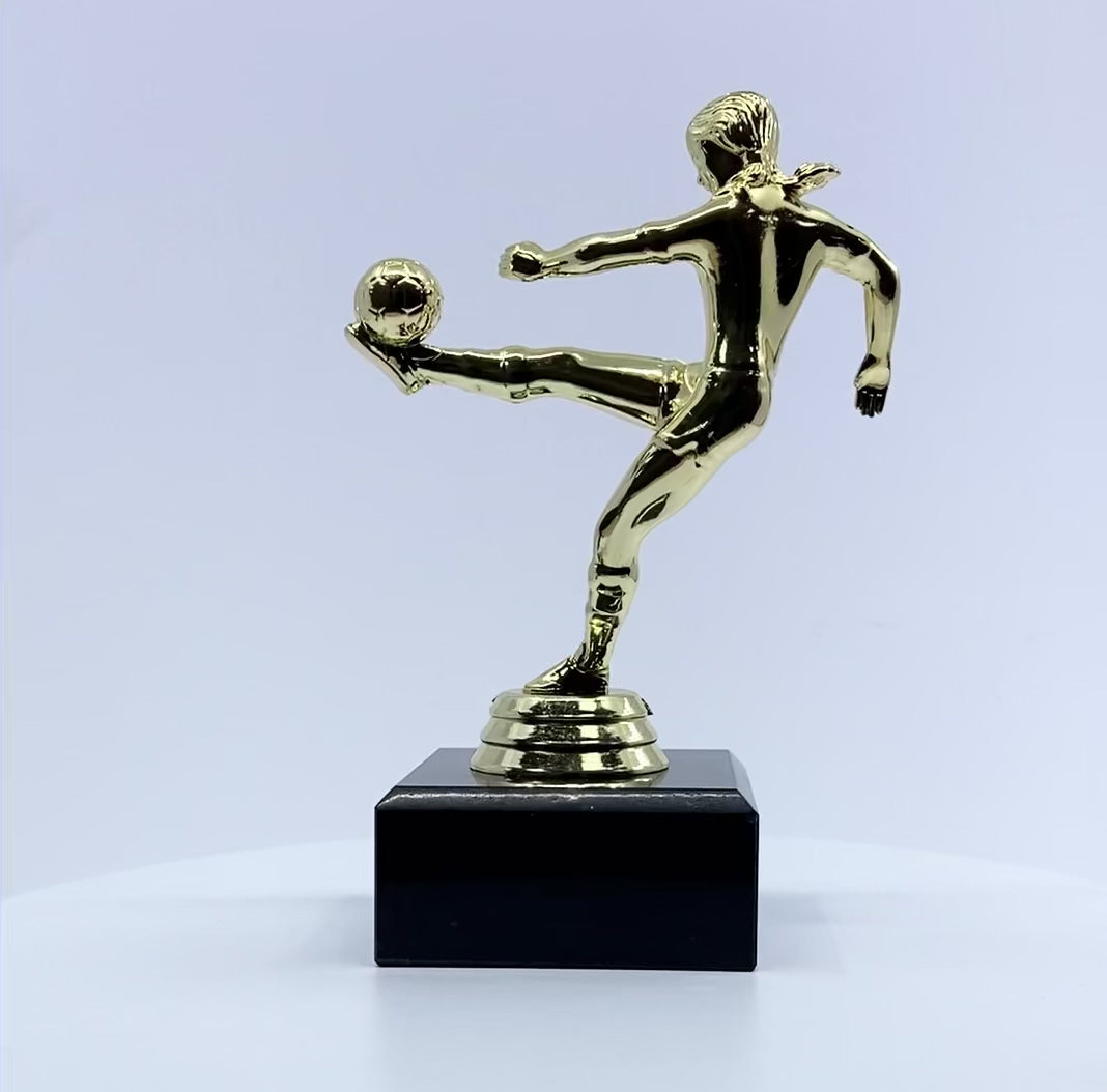 Load video: Girls Volley Football Trophy with Marble Base Video by School Badges UK