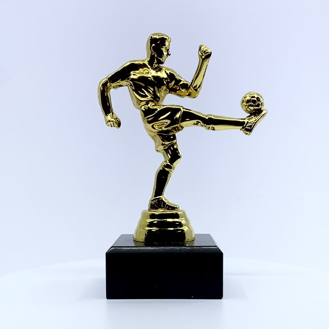 Load video: Boys Volley Football Trophy with Marble Base Video by School Badges UK