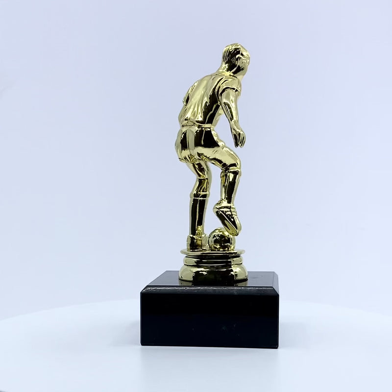 Dribbling Football Trophy with Marble Base Video by School Badges UK